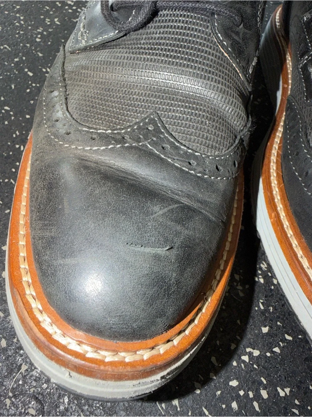 Johnston & Murphy Black Leather Wingtip Oxfords with Tan Welt